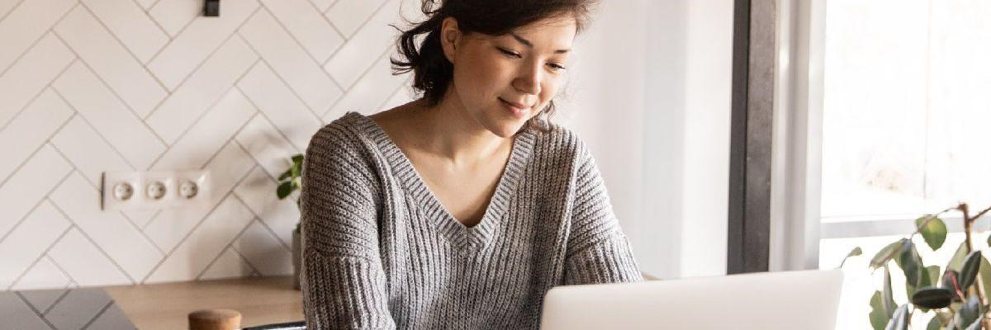 Lady browsing the internet from home