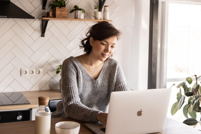 Lady browsing the internet from home