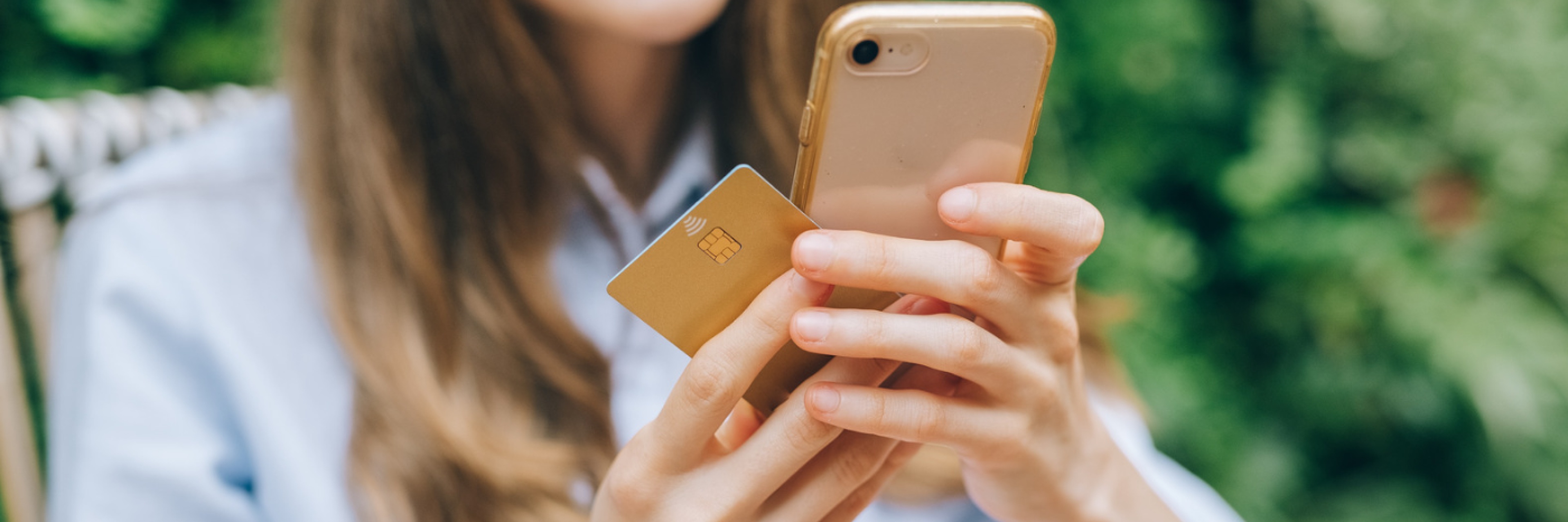 Woman with phone and credit card