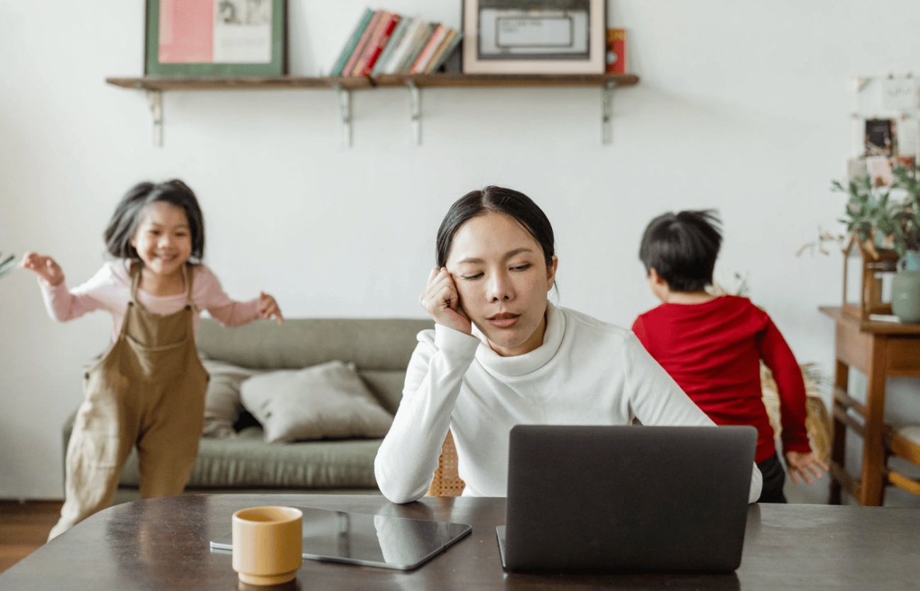 Stressed woman with kids