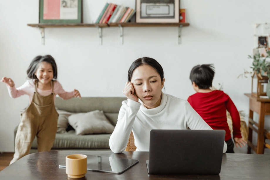 Stressed woman with kids